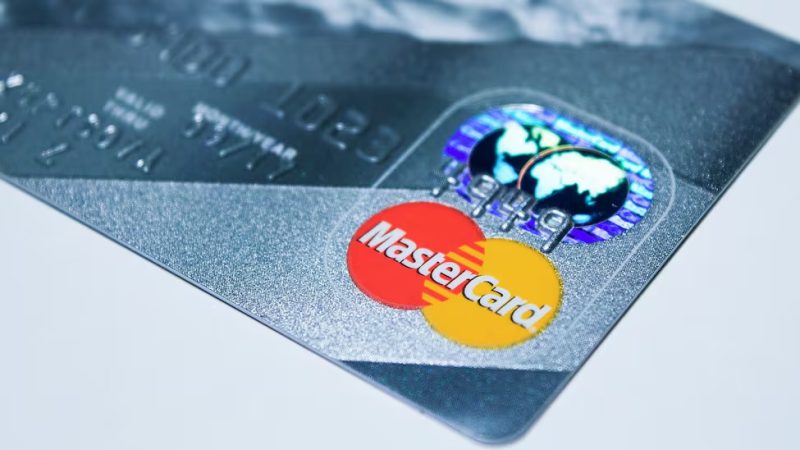 1inch Network, a leading decentralized exchange (DEX) aggregator, in collaboration with Mastercard and Baanx, has announced the launch of the 1inch Card, a cutting-edge Web3 debit card. This innovative card is set to bridge the gap between cryptocurrency and traditional finance, allowing users to effortlessly convert and spend their crypto assets in the real world. A Seamless Crypto-to-Fiat Experience The 1inch Card marks a significant milestone in the integration of cryptocurrency with daily financial transactions. Users can now enjoy the convenience of using their crypto holdings for both online and physical store purchases, as well as withdrawing cash from supported ATMs. This seamless crypto-to-fiat conversion process promises to enhance the utility and accessibility of digital assets for a broader audience. Mastercard’s Web3 Ventures The involvement of Mastercard, a global payments giant, highlights the increasing interest of traditional financial institutions in the potential of Web3 and decentralized applications. Mastercard’s recent collaborations, including its work with the Ethereum wallet Metamask, underscore the company’s commitment to exploring the convergence of traditional payments with the innovative world of Web3. Empowering Users in the Crypto Ecosystem The 1inch Card is not just a tool for spending; it represents a significant leap towards integrating the traditional and crypto worlds in a user-empowered manner. As explained by Simon Jones, Chief Commercial Officer at Baanx, the card is designed to give users complete control over their digital assets, making them “spendable in over 160 million locations worldwide.” This approach aligns with the vision of both 1inch and Baanx to make cryptocurrency a more integrated part of everyday financial activities. A Card for Every User With the launch of the 1inch Card, users will have the option to choose between a physical and a virtual card, ensuring that the benefits of a standard debit card are extended into the realm of cryptocurrency. This development is a step forward in making digital assets more tangible and practical for daily use. Mastercard’s Senior Vice President, Crypto and Fintech Enablement, Christian Rau, remarked on the innovative nature of the 1inch Card, emphasizing its role in connecting the traditional financial world (Web2) with the burgeoning space of Web3. This partnership and product launch signal a significant moment in the ongoing evolution of how we interact with, spend, and manage digital currencies in our daily lives.